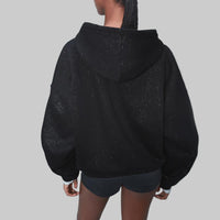 - Sudadera con capucha de purpurina