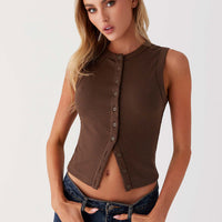 - Cárdigan sin mangas