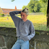 - Chaqueta de punto con chaleco