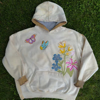 - Sudadera con capucha floral