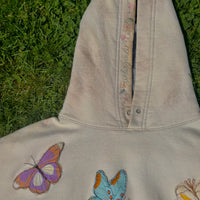 - Sudadera con capucha floral