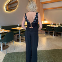 - Pantalones de traje con ribete de encaje