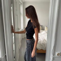 - Camiseta de manga corta