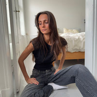 - Camiseta de manga corta