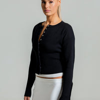 - Cárdigan abotonado