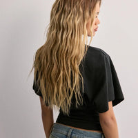 - Camiseta de manga ancha