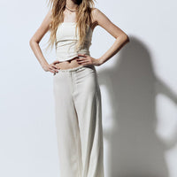 - Pantalones de lino