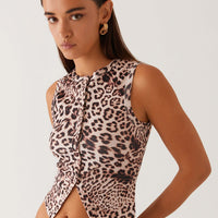 - Cárdigan sin mangas