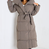 - Abrigo largo acolchado