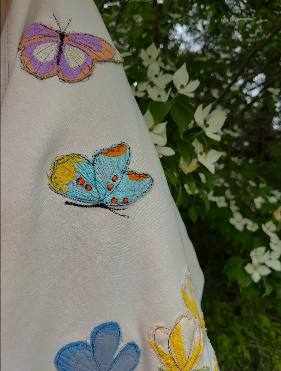 - Sudadera con capucha floral