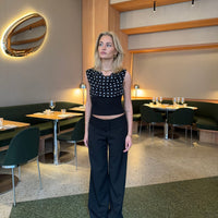 - Pantalones de traje con ribete de encaje