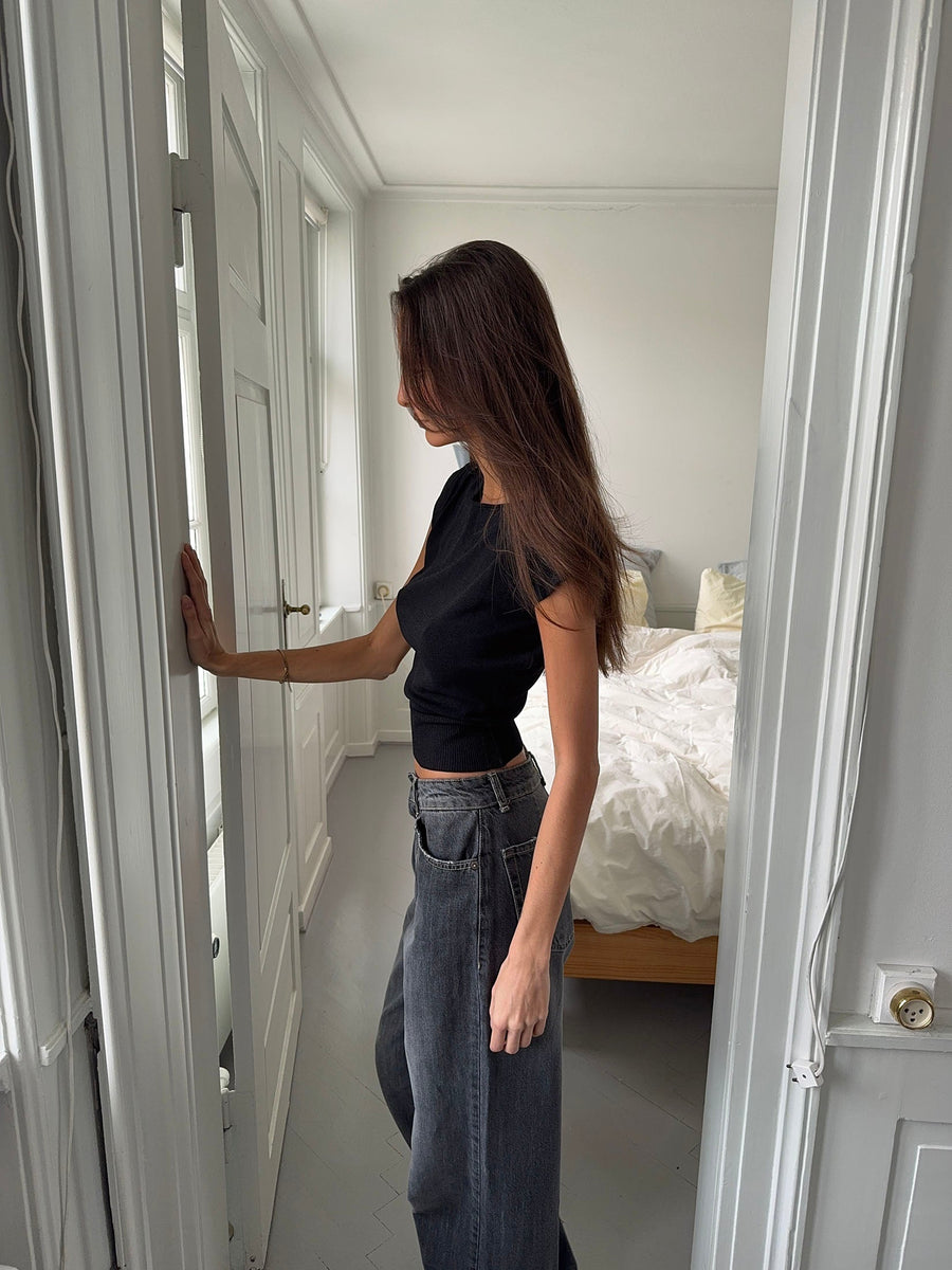 - Camiseta de manga corta