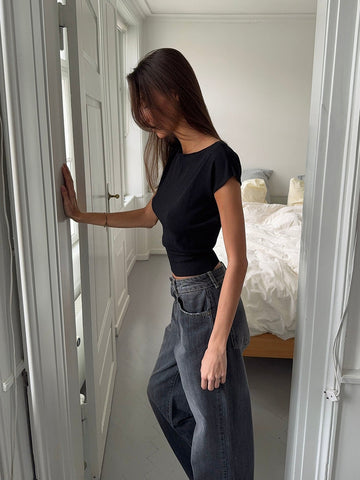 - Camiseta de manga corta