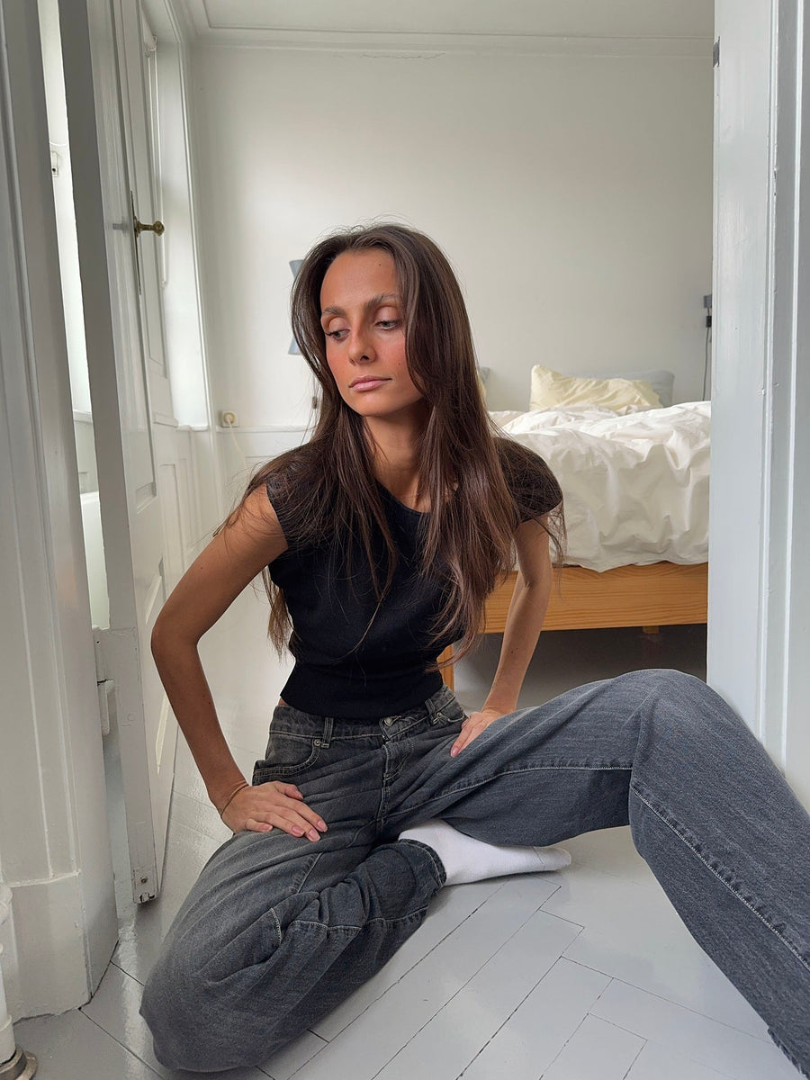 - Camiseta de manga corta