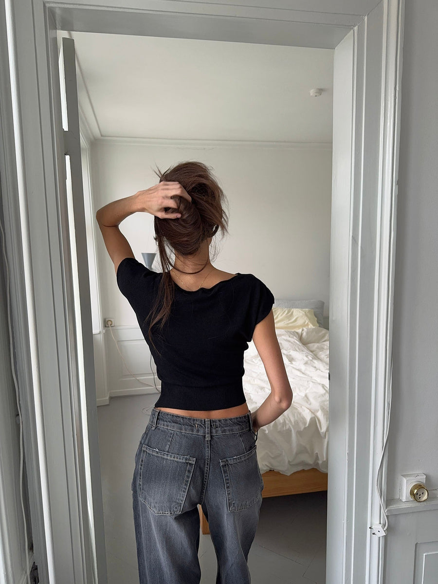 - Camiseta de manga corta