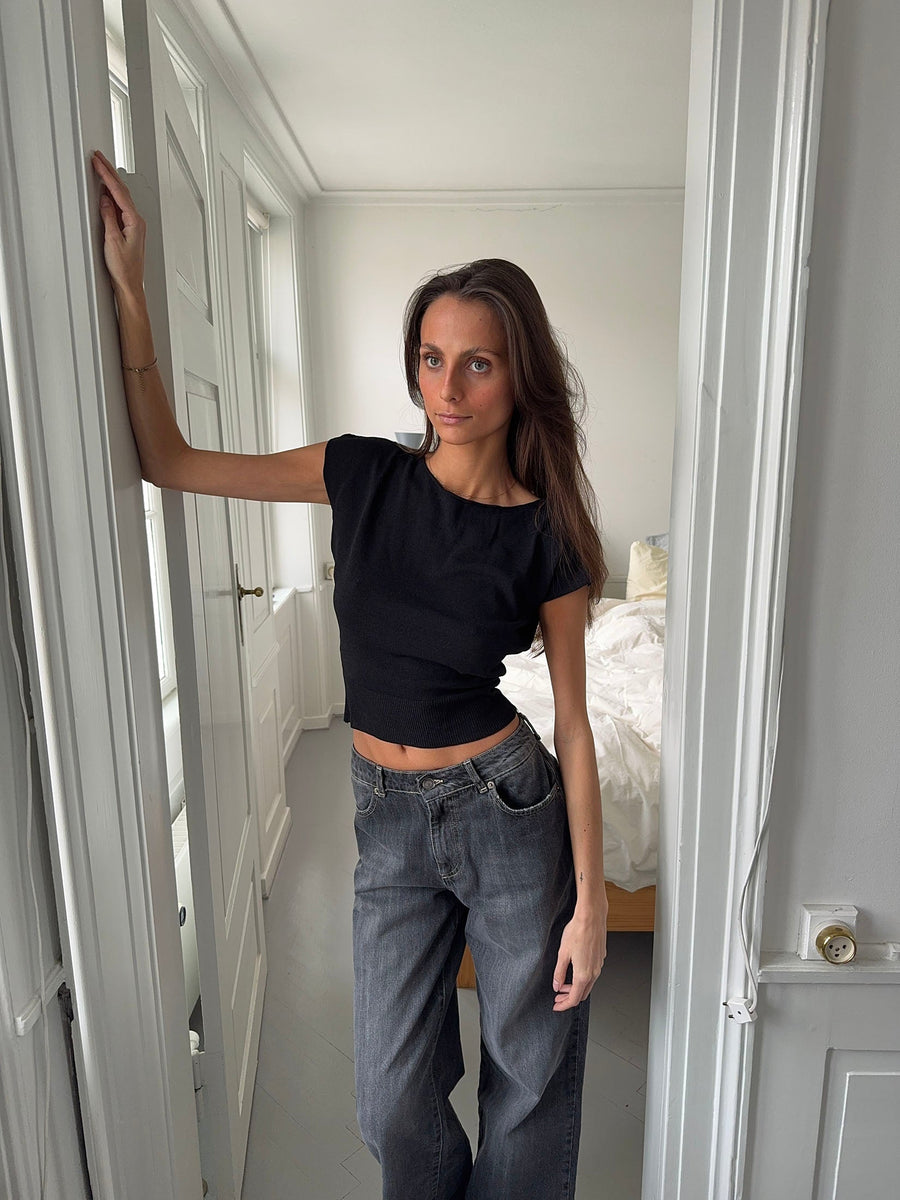 - Camiseta de manga corta