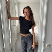 - Camiseta de manga corta